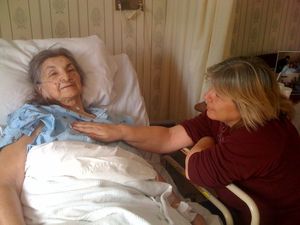 Deb giving Moose reiki