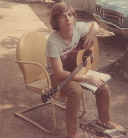 Here's Ned with his guitar